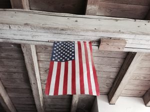 U.S. American flag hanging on ceiling
